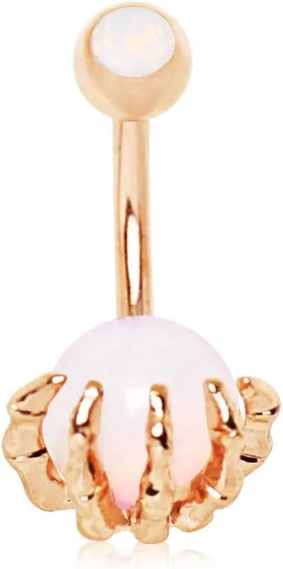WILDKLASS Rose Gold Plated Skeleton Hand Holding Crystal Ball Navel Ring